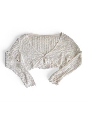 delicate cream knit bolero with faux pearl button